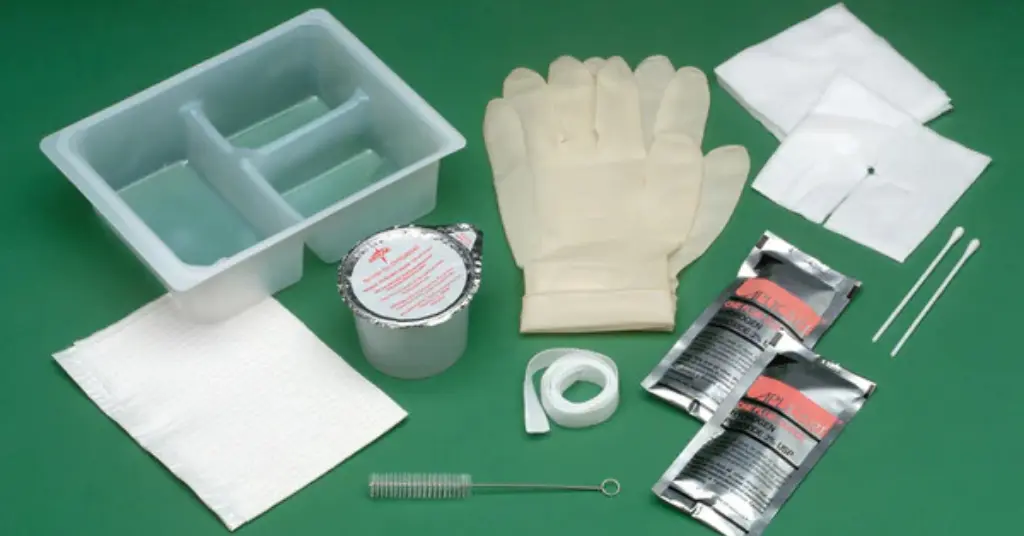 Tracheostomy care essentials including a trach tube, heat and moisture exchanger (HME), suction catheter, and other accessories displayed on a white background Tracheostomy Supplies Covered by Insurance safe tracheostomy care at home